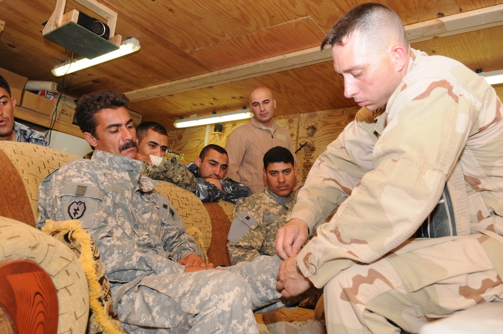 Combat Lifesaver Course given to the Iraqi Police Counter Explosive Team in Tikrit, Iraq