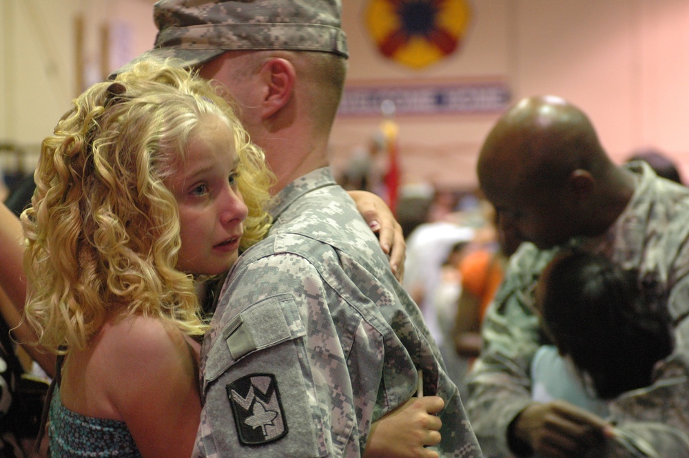 4th Sustainment Brigade Headquarters Soldiers come home, 1st Medical Brigade Headquarters Soldiers case colors for a deployment