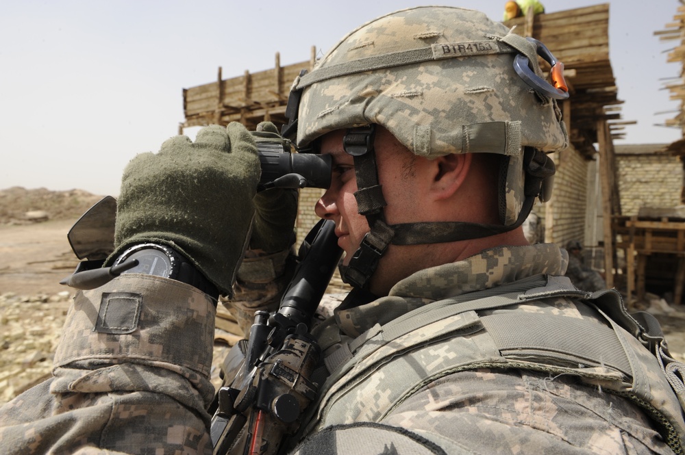 Cavalry Soldiers conduct field clearing mission