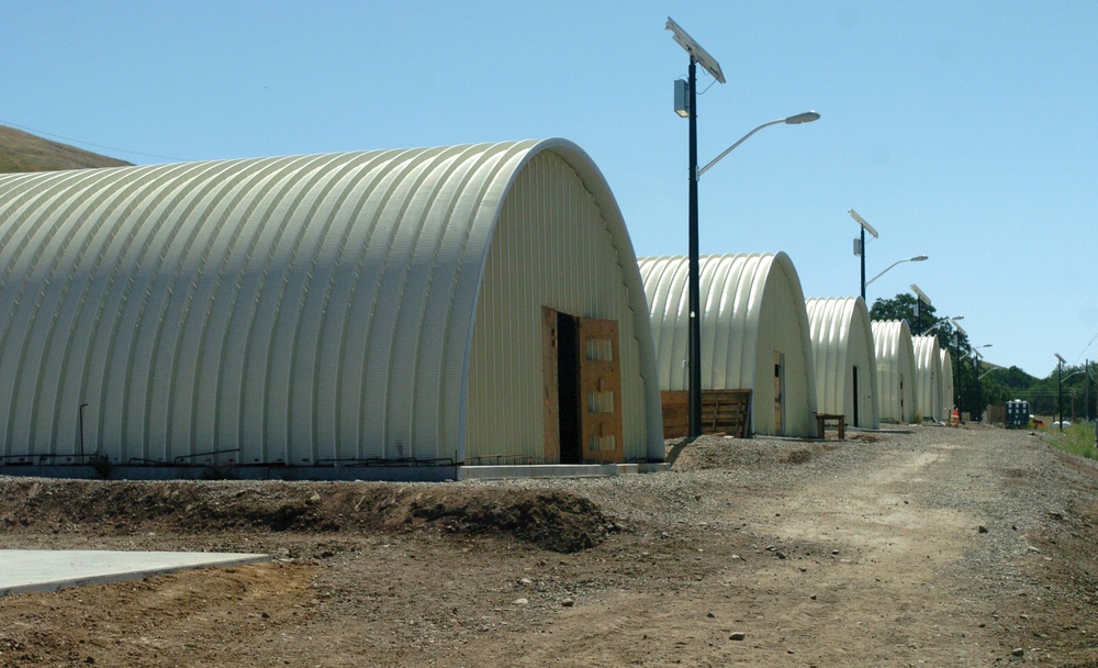Twelve Dallas Reservists Build Three Steel Barracks in Two Weeks