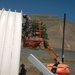 Twelve Dallas Reservists Build Three Steel Barracks in Two Weeks