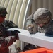 Twelve Dallas Reservists Build Three Steel Barracks in Two Weeks