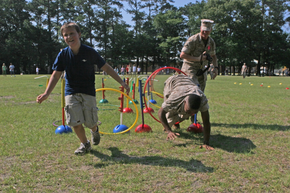Off the ship, into the playground: Marines assist field meet at local elementary school