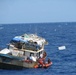 Crew From Coast Guard Cutter Key Biscayne Assists Haitian Vessel in Distress