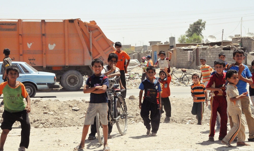 Friends helping friends: Basra government takes out trash, cleans city