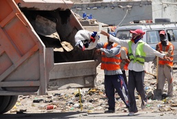 Friends helping friends: Basra government takes out trash, cleans city