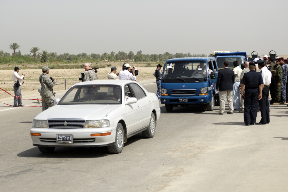 Iraqi Public Gains Highway Access: Convoy Managers Adjust for Lane Loss