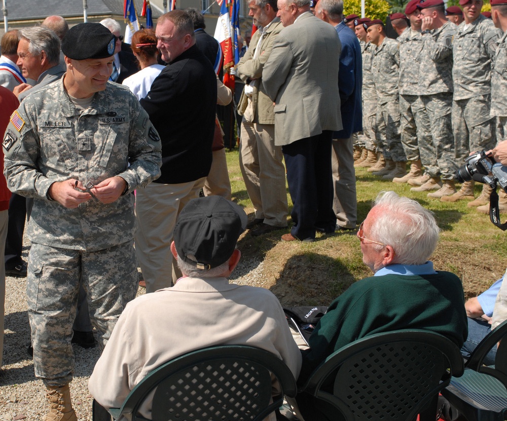 French citizens join U.S. Soldiers past and present to honor those who fought at Gourbesville during Normandy invasion