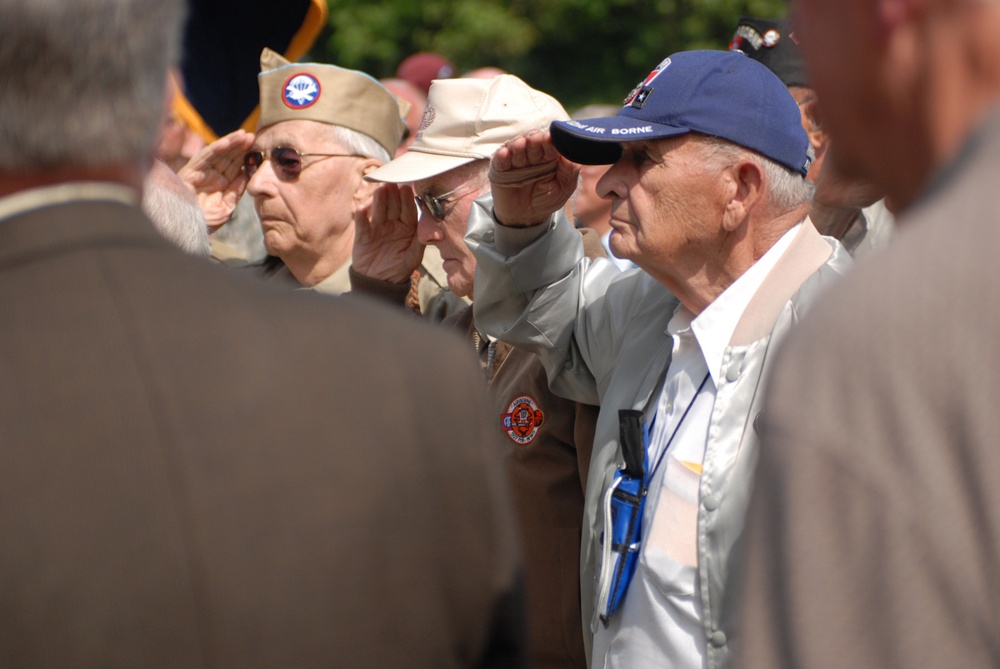 French citizens join U.S. Soldiers past and present to honor those who fought at Gourbesville during Normandy invasion