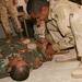 Multi-National Force - West corpsmen teach Iraqi commandos lifesaving skills