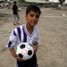 Soccer balls and dolls; Americans make Iraqi children smile