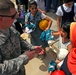 Soccer balls and dolls; Americans make Iraqi children smile