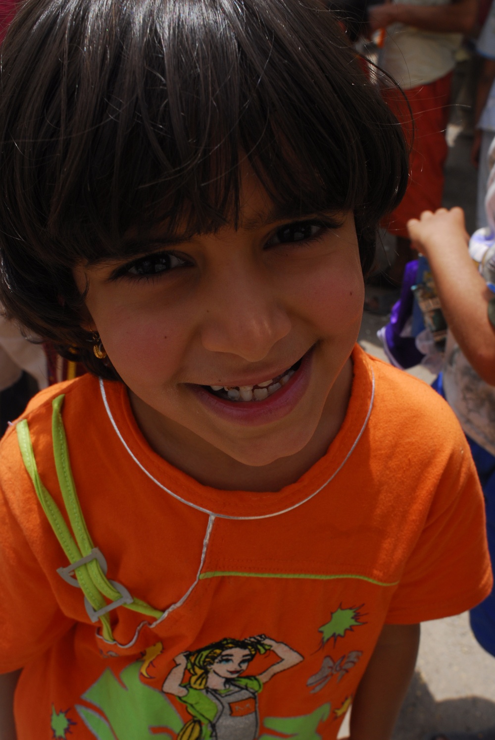 Soccer balls and dolls; Americans make Iraqi children smile