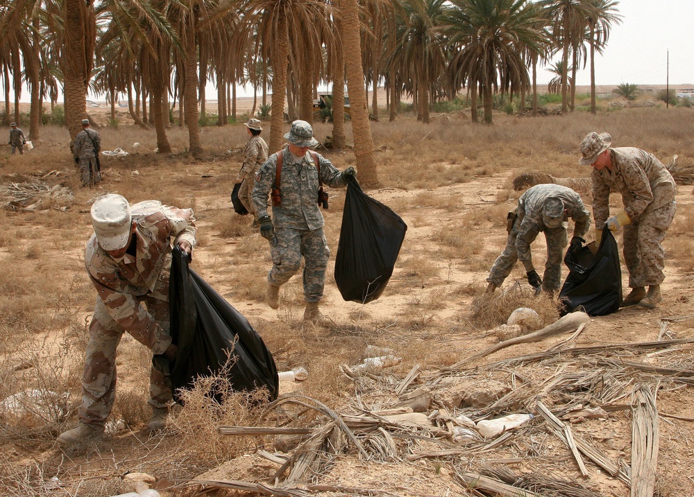 Iraqi and U.S. service members unite to restore historic sight.