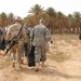 Iraqi and U.S. service members unite to restore historic sight.