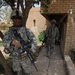 U.S. Soldiers speak with Iraqi security force leaders in Baghdad