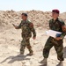Multi National Force - West Marines give Iraqi soldiers direction