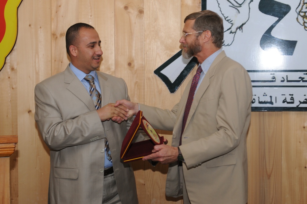 Soldiers, Iraqis hold fairwell for reconstruction team leader