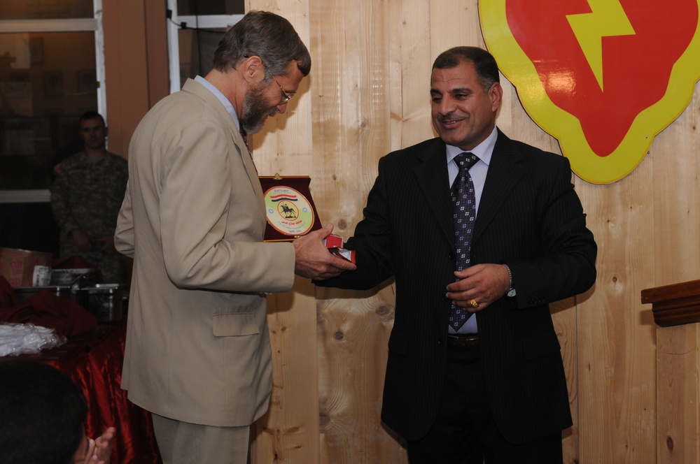 Soldiers, Iraqis hold fairwell for reconstruction team leader