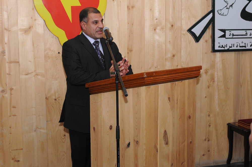 Soldiers, Iraqis hold fairwell for reconstruction team leader