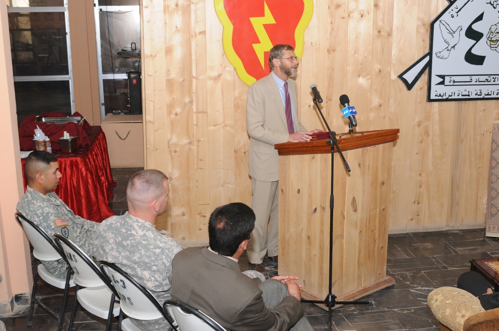 Soldiers, Iraqis hold fairwell for reconstruction team leader
