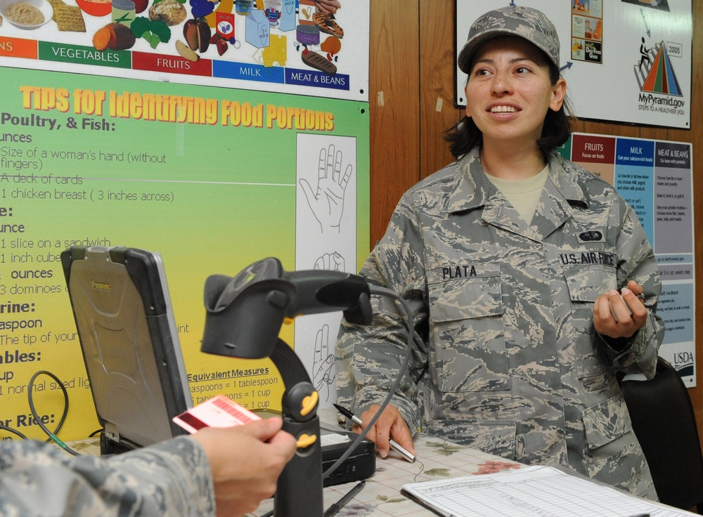 Dallas native Airmen checks ID cards at Balad