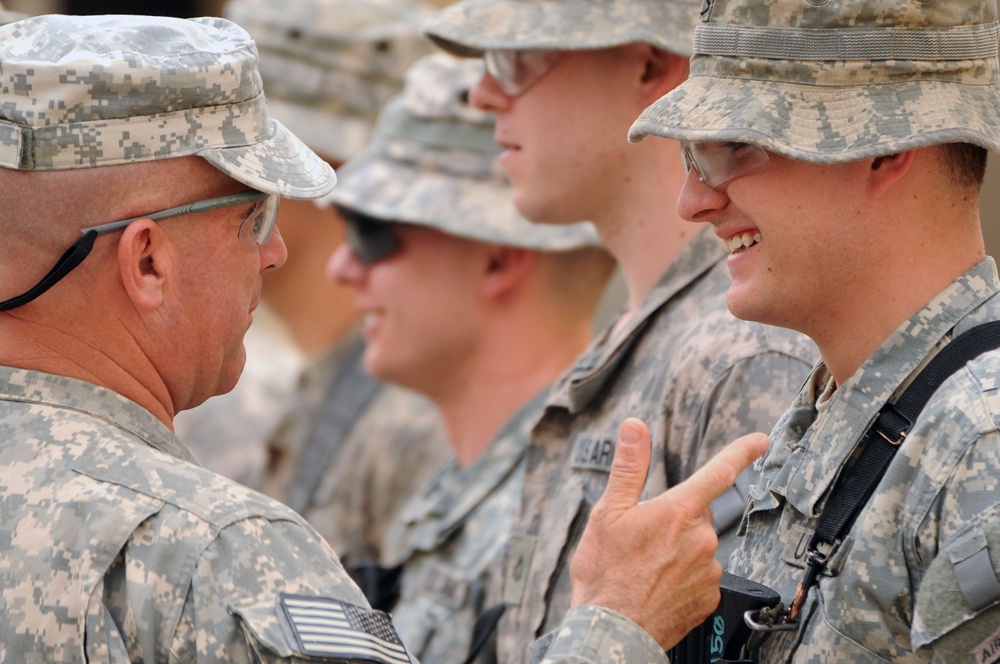 Command Sgt. Maj. Wilson Coins Soldiers in Baghdad, Iraq