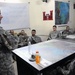 Command Sgt. Maj. Wilson Coins Soldiers in Baghdad, Iraq