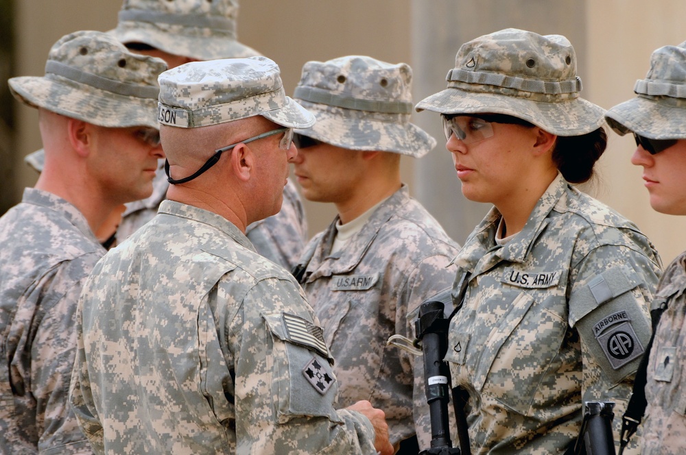 Command Sgt. Maj. Wilson Coins Soldiers in Baghdad, Iraq