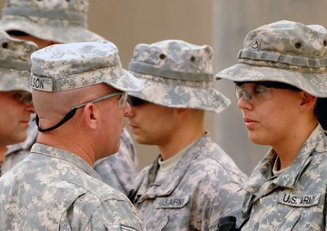 Command Sgt. Maj. Wilson Coins Soldiers in Baghdad, Iraq