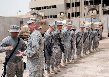 Command Sgt. Maj. Wilson Coins Soldiers in Baghdad, Iraq