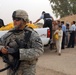 Iraqi and U.S. Soldiers deliver food, soccer balls in Kirkuk province