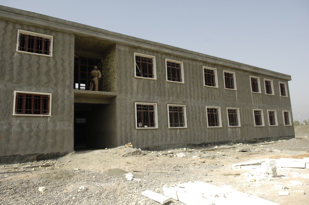 U.S. Army Corps of Engineers check the progress on construction projects in Al Mushroo