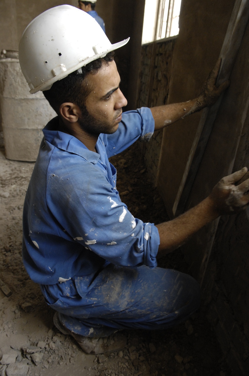 U.S. Army Corps of Engineers check the progress on construction projects in Al Mushroo