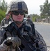 Military Police paratroopers patrol along main Baghdad highway