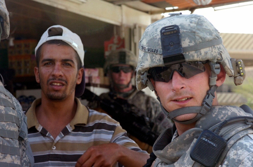 Military Police paratroopers patrol along main Baghdad highway