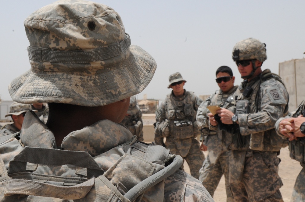 Iraqi soldiers patrol neighborhood east of Baghdad, Iraq