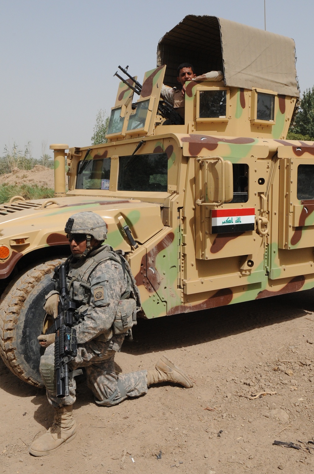 Iraqi soldiers patrol neighborhood east of Baghdad, Iraq