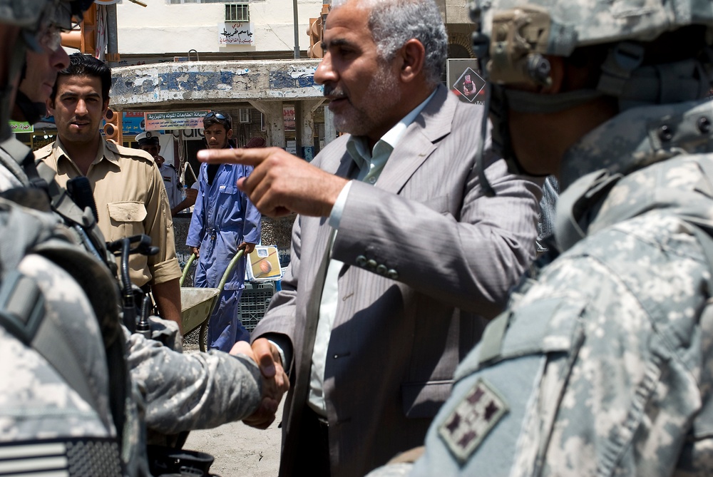 U.S. troops make effort to clean up Al Ashar canal