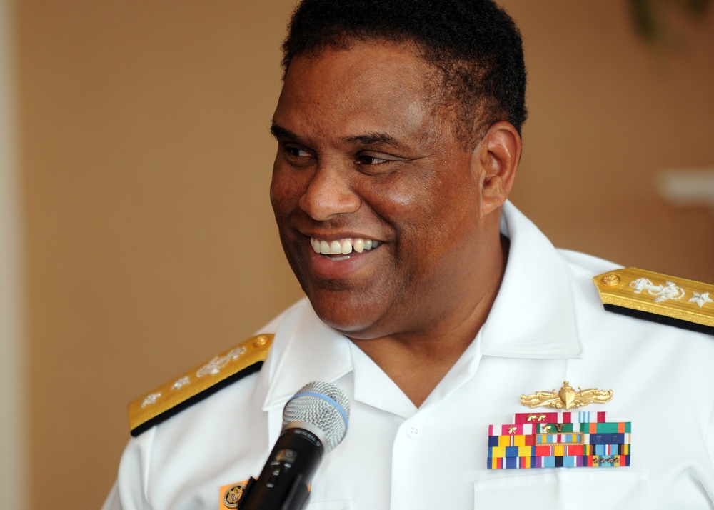 Rear Adm. Victor G. Guillory takes command