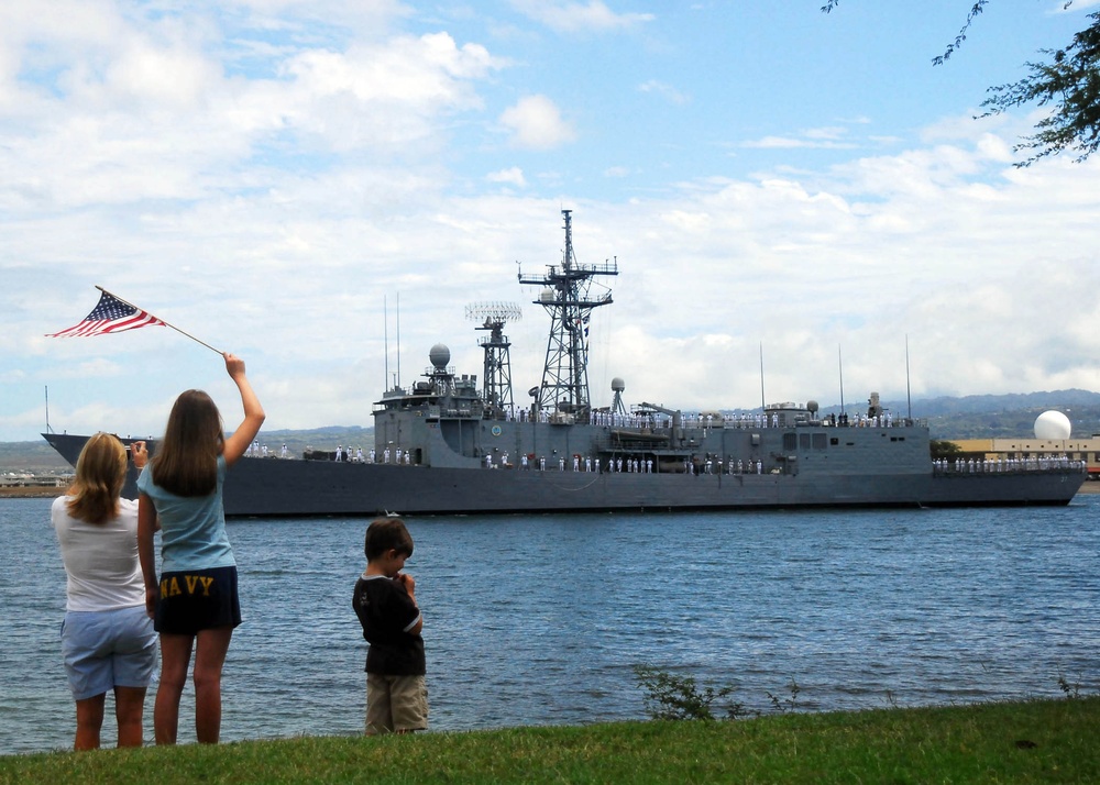 Watching USS Crommelin depart