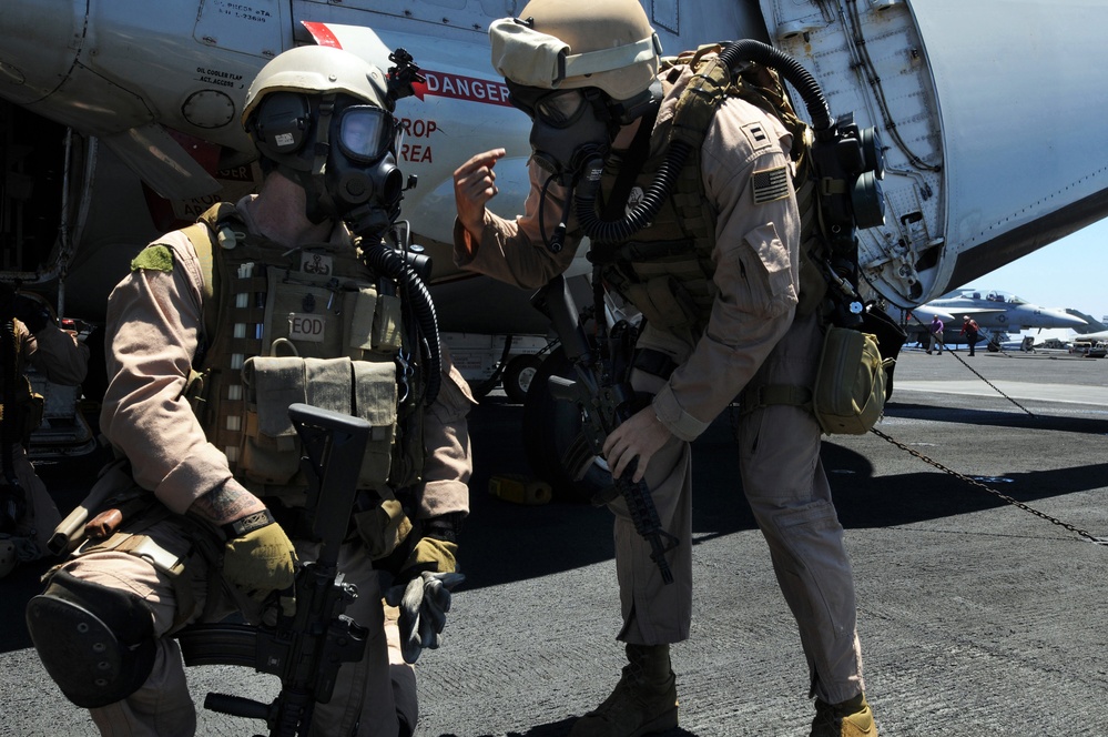 Explosive ordnance disposal fast ropes into action