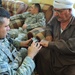 Coalition and Iraqi police forces team up to distribute micro-grant funds to assist local farmers