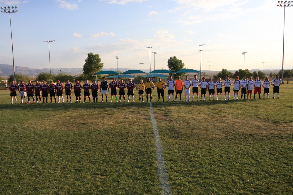 British Soccer Camp coaches show Combat Center children skills, sportsmanship