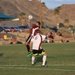 British Soccer Camp coaches show Combat Center children skills, sportsmanship