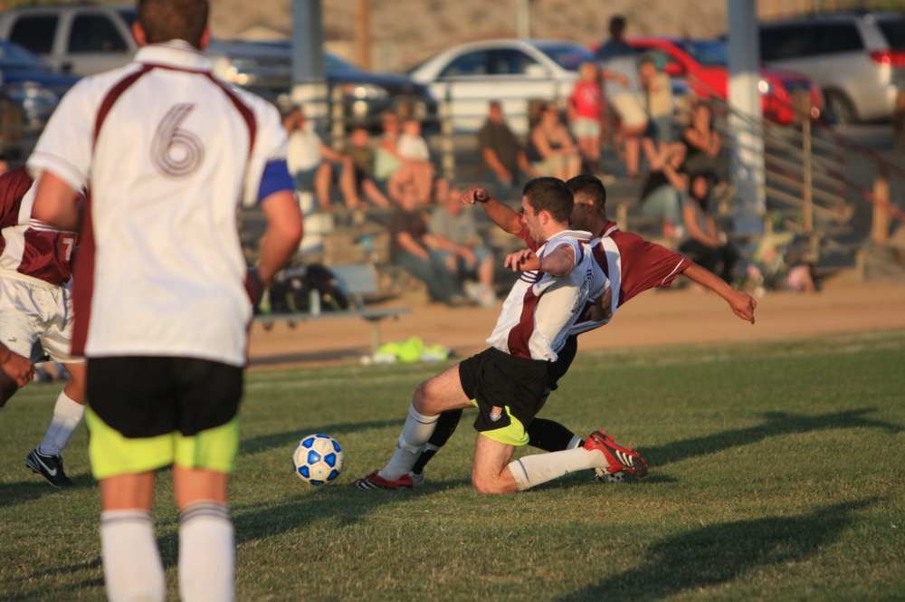 British Soccer Camp coaches show Combat Center children skills, sportsmanship