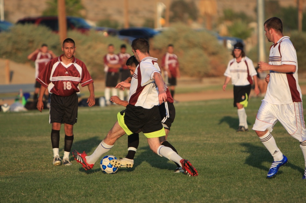 British Soccer Camp coaches show Combat Center children skills, sportsmanship