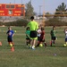 British Soccer Camp coaches show Combat Center children skills, sportsmanship