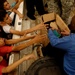 Iraqi Police Officers hand out school supplies in Mosul, Iraq