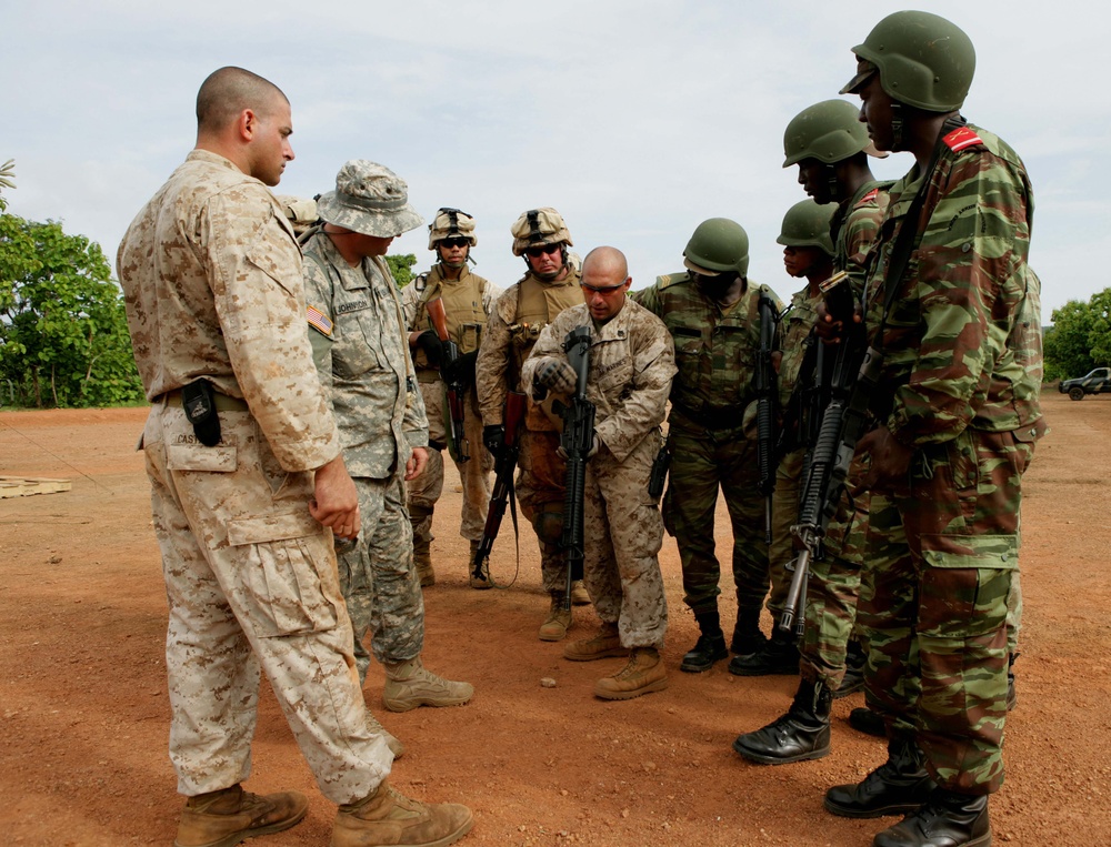 Benin, U.S. service members trade, fire weapons